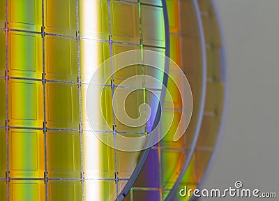 Silicon Wafers and Microcircuits - A wafer is a thin slice of semiconductor material, such as a crystalline silicon, used in Stock Photo