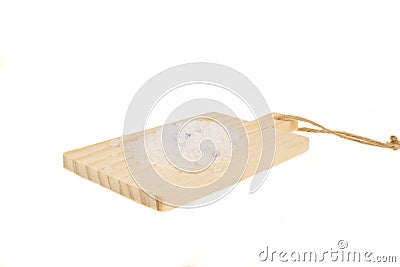 Silicone cat litter in bulk on wooden cutting board isolated in white background Stock Photo