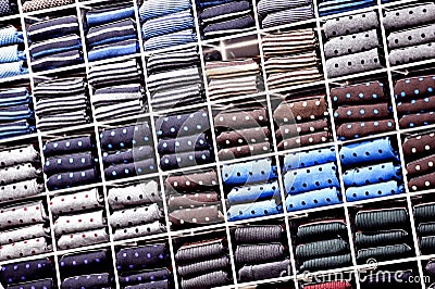 Silk neckties on shelves in a store Stock Photo