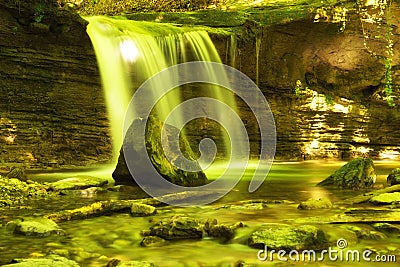 Silky waterfall in forest Stock Photo