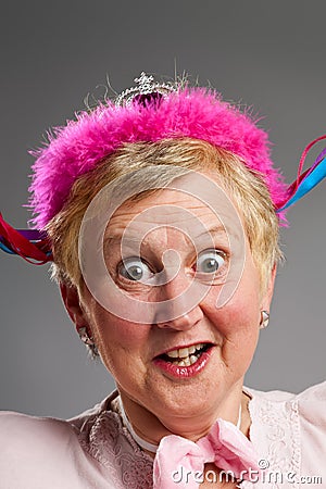 Silly face with pink tiara Stock Photo