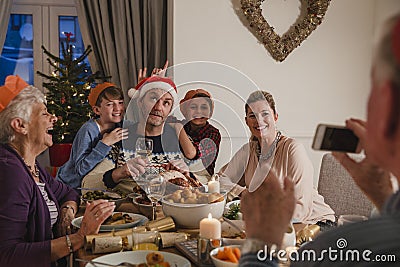 Silly Family Christmas Dinner Photo Stock Photo