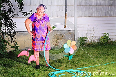 Silly happy granny gardener Stock Photo