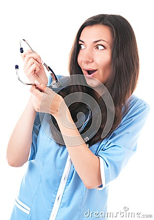 Silly looking amazed woman with phonendoscope Stock Photo