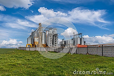 silos on agro-industrial complex with seed cleaning and drying line for grain storage Stock Photo