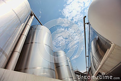 Silos and tank - industrial infrastructure Stock Photo