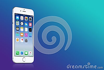 Silver Apple iPhone 7 with iOS 10 on the screen on blue gradient background with copy space Editorial Stock Photo