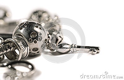 Silver charm bracelet Stock Photo