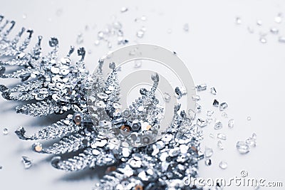 Silver Christmas decoration in sparkles and shiny shattered glass on a white background Stock Photo