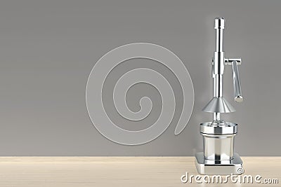 Silver citrus juicer in the kitchen Stock Photo