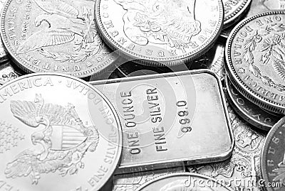 Silver coins and bars macro shot Stock Photo