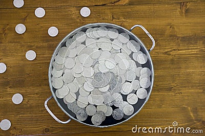Silver coins in old pot Stock Photo