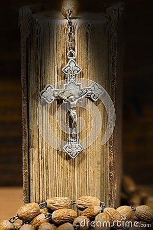 Silver Crucifix Rosary Bead and Holy Bible Stock Photo