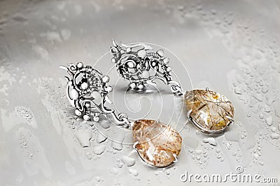 Silver drop earrings with rutile quartz-1 Stock Photo