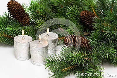 Silver festive candles Stock Photo