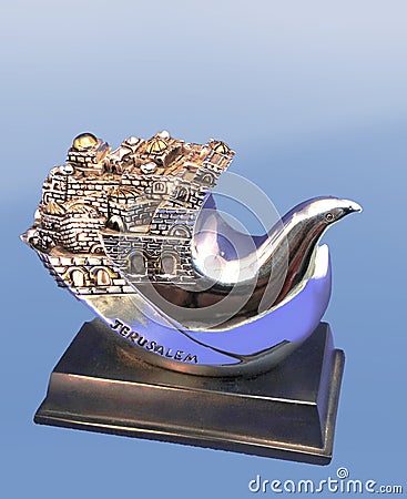 A silver figurine depicting the city of Jerusalem in the form of a ship and a bird Stock Photo