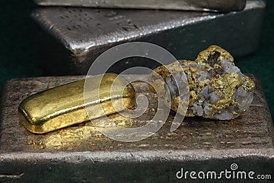 Silver & Gold Bullion Bars (Ingots) and Gold / Quartz Specimen Stock Photo