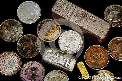 Silver and Gold Bullion - Bars and Rounds Editorial Stock Photo