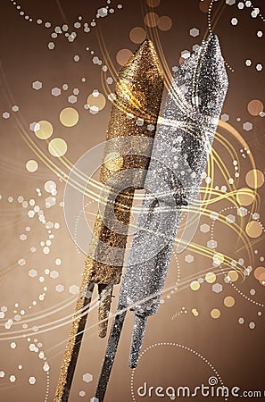 Silver and gold festive rocket fireworks Stock Photo