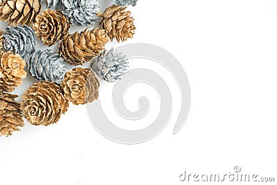 Silver and Gold Pinecones on White Background. Winter, Holiday, Christmas, Background Stock Photo