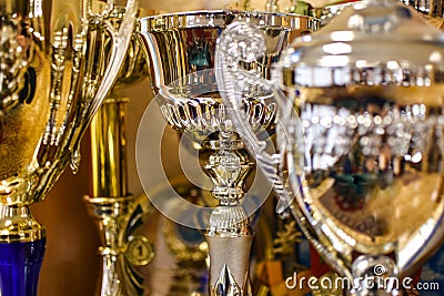 Silver and gold sports cups, close-up Stock Photo