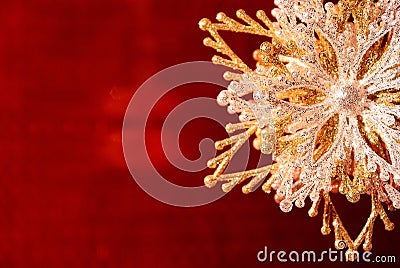Silver-golden snowflake on red Stock Photo