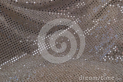 Silver grey polka dot sequined fabric background Stock Photo