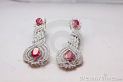 Silver handmade earings with big red rubies Stock Photo