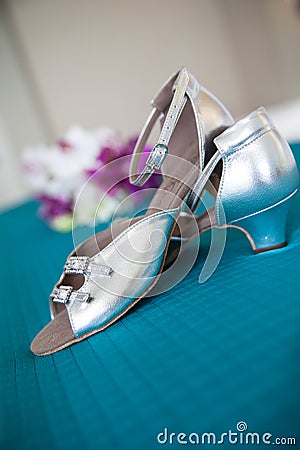 Silver high heeled shoes Stock Photo