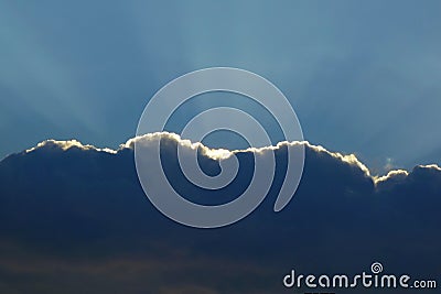 Silver lining dark cloud sun rays Stock Photo