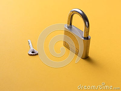 Silver lock with key stock image. Stock Photo