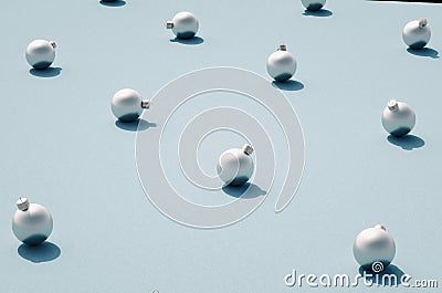 Silver matt Christmas balls on blue background Stock Photo