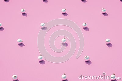 Silver matt Christmas balls on pink background Stock Photo