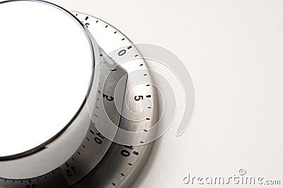 Silver Mechanical Cooking Timer on White Background Stock Photo