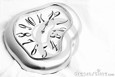 Silver melted clock Stock Photo