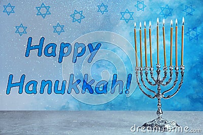 Silver menorah on table. Happy Hanukkah Stock Photo