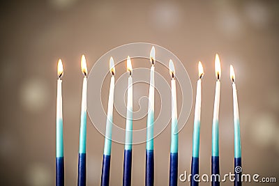 A silver menorah for the Jewish holiday Hanukkah with eight unlit candles Stock Photo