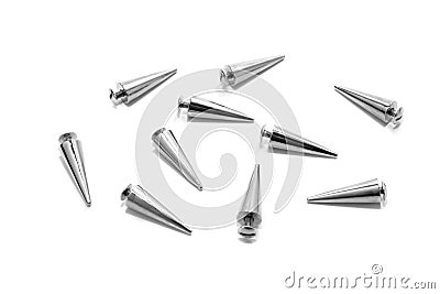 Silver metal spikes isolated on white background. Stock Photo