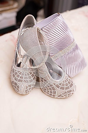 Silver, metallic and diamante High heels and clutch purse Stock Photo