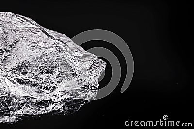 silver nugget native to Liberia isolated on black background Stock Photo