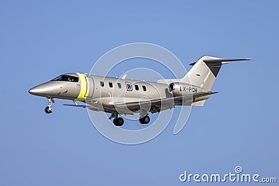 Silver Pilatus jet on a nice day Editorial Stock Photo