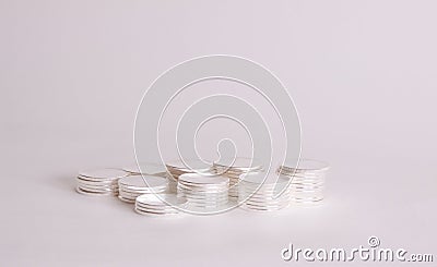 Silver rounds or bullion or treasure. Stock Photo