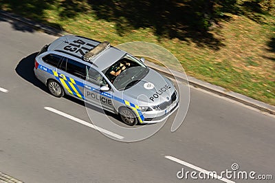 Silver Skoda Octavia Combi police car of Policie Ceske Republiky (PCR) with motion blur effect Editorial Stock Photo