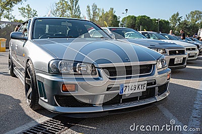 silver tenth generation Nissan Skyline GT R34 at a Japanese car meet Editorial Stock Photo