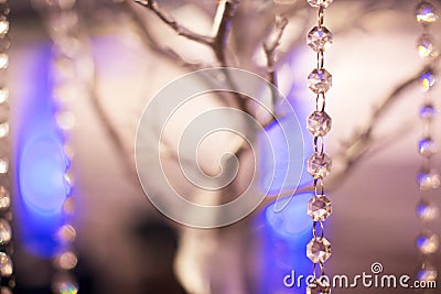 Silver Tree and Glass String Bead Table Arrangement Stock Photo