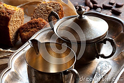 Silver utensil, bread and cocoa Stock Photo