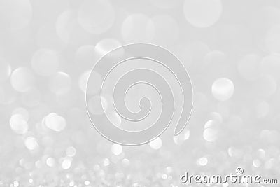 Silver white glittering Christmas lights. Blurred abstract background. Stock Photo