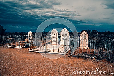 Graves of the outback desert under an impending storm Editorial Stock Photo