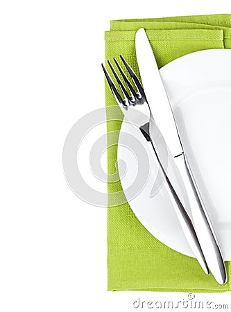 Silverware or flatware set of fork and knife over plate Stock Photo