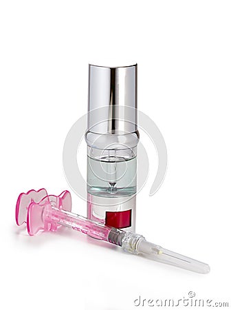 Silvery ampoules, small bottles, medical or cosmetic appointment and syringe Stock Photo